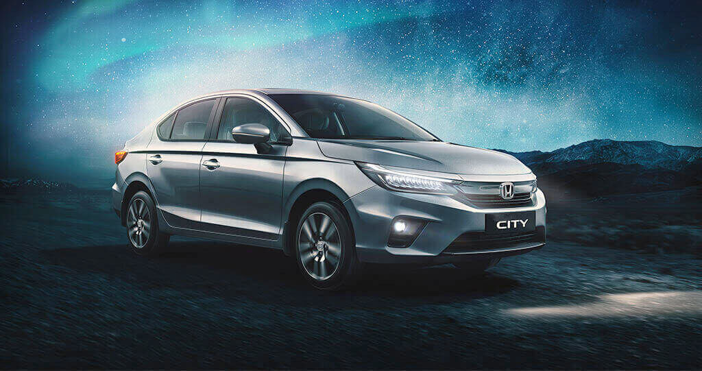 Honda City 2020 on road with Bright Stars in Sky in Mountain Region