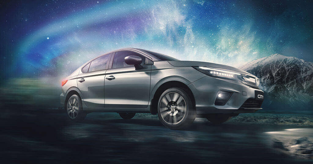 All New 5th Generation Honda City 2020 on road with Bright Stars in Sky in Mountain Region
