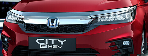 New Honda City e:HEV Exterior - New Honda Solid Wing Face with e:HEV Signature Blue H-mark Logo