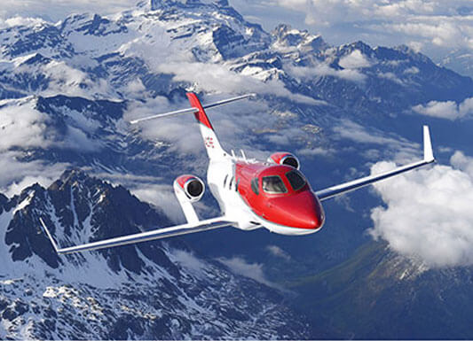 Front View of Flying Red Hondajet 