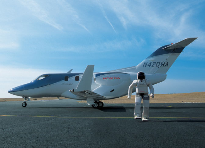Asimo Robot Standing with Hondajet