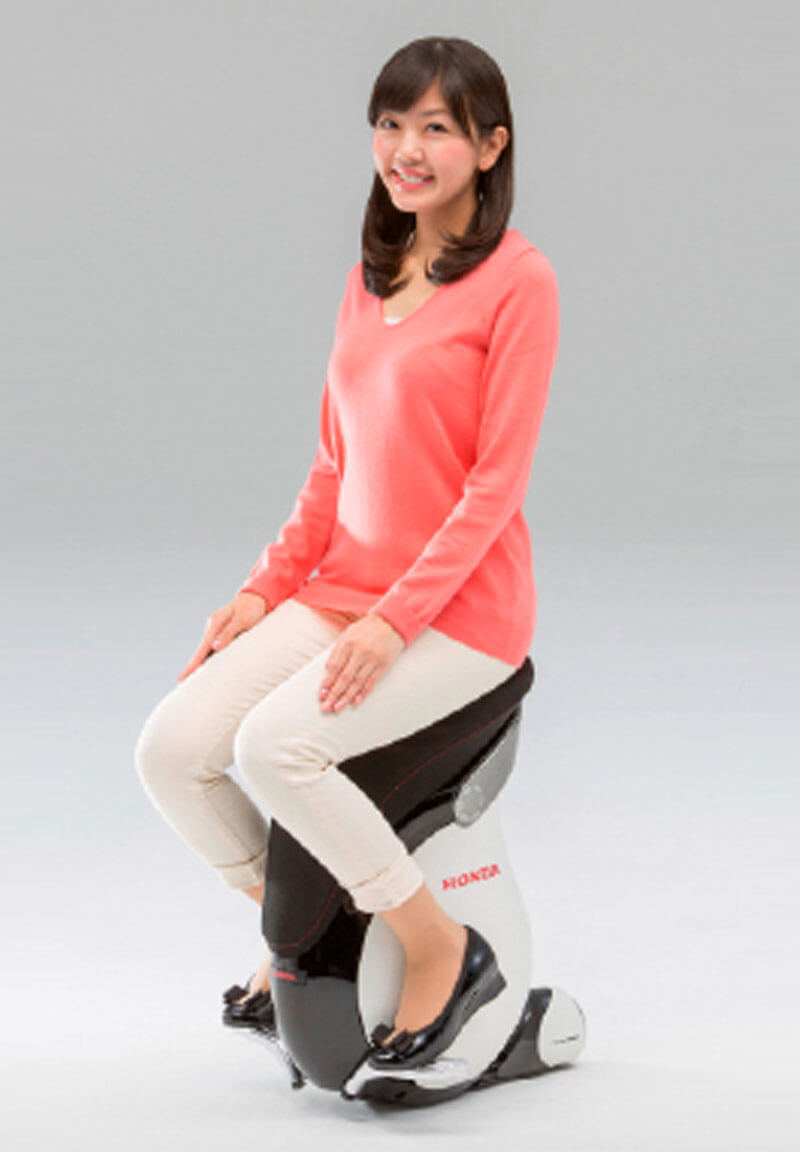 Girl sitting on the Unicub