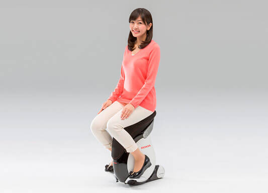 Girl sitting on the Small Unicub